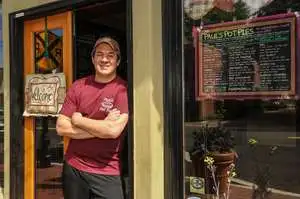 Chef Paul in front of his shop